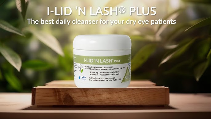 Jar of I-LID 'N LASH PLUS on a wooden surface with greenery in the background