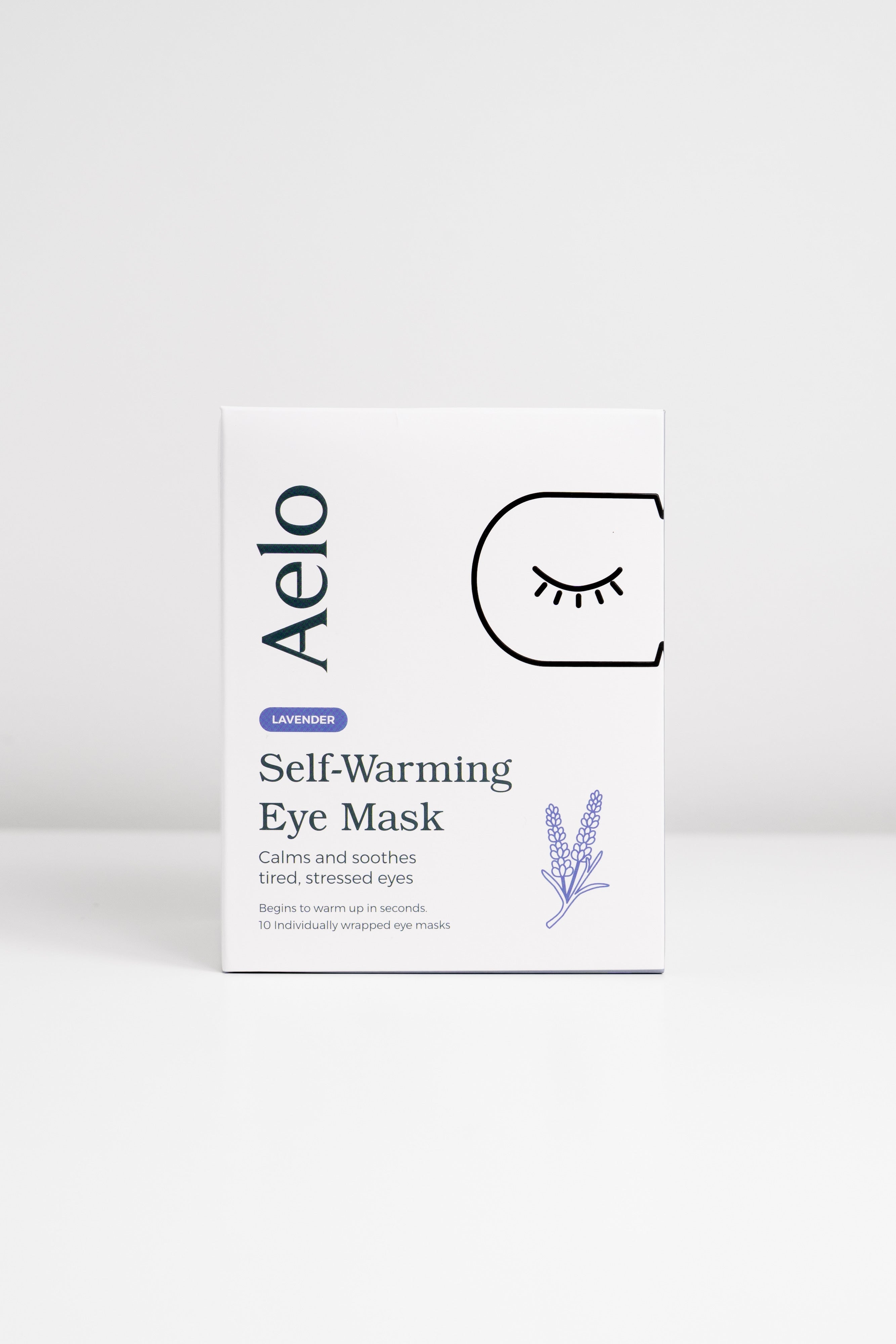 A box of Aelo Self-Warming Eye Mask that calm and soothe tired, stressed eyes.