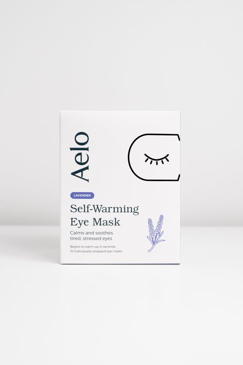 A box of Aelo Self-Warming Eye Mask that calm and soothe tired, stressed eyes.