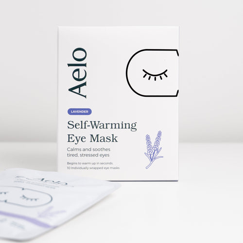 A box of Aelo Self-Warming Eye Mask that calm and soothe tired, stressed eyes.