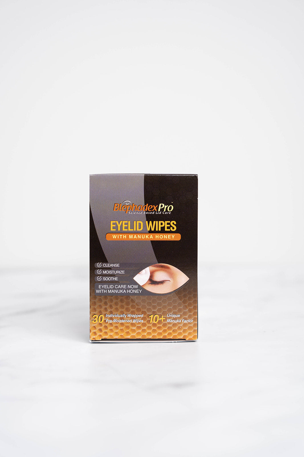 A 30 pack of Blephadex Pro Eyelid Wipes with Manuka Honey in a bathroom.