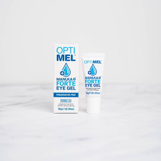 A box and bottle of Optimel Manuka Forte+ Eye Gel for dry eyes and blepharitis.