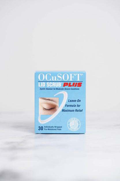 A box of Ocusoft Lid Scrub Plus Eyelid Wipes.