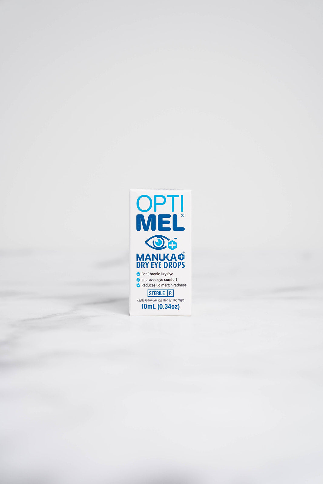 A 10ml bottle of Optimel Manuka Honey Dry Eye Drops.