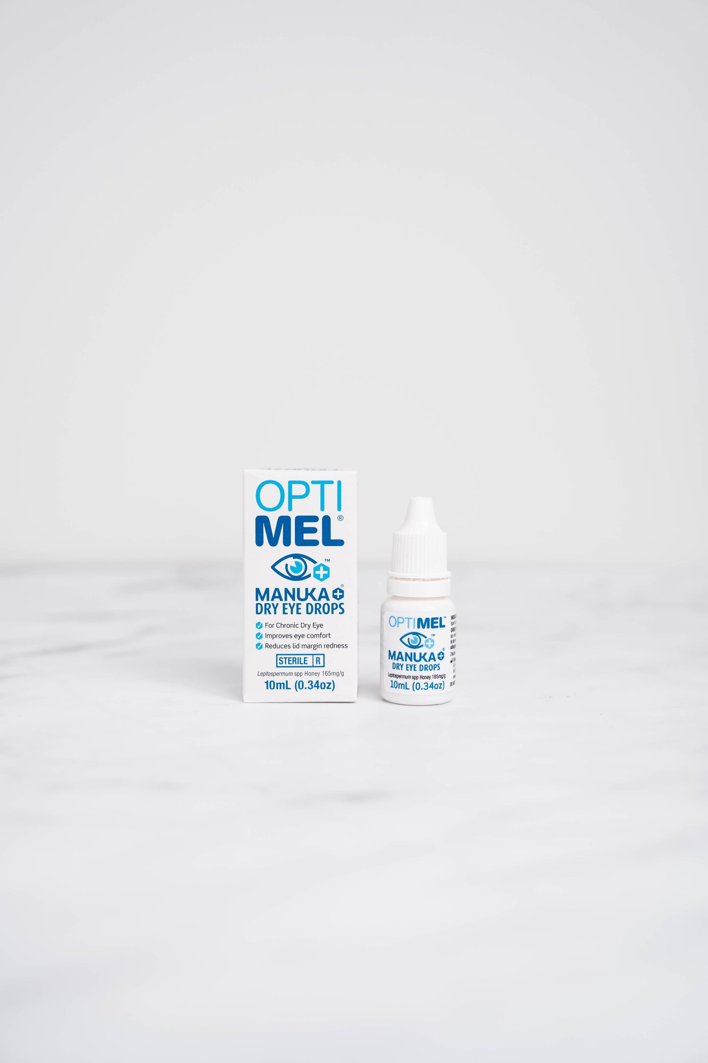A bottle Optimel Manuka+ Honey Eye Drops.
