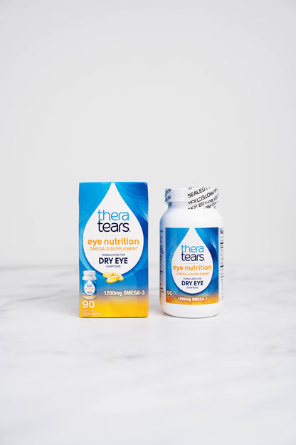 A bottle and box of TheraTears Eye Nutrition for Dry Eyes. Each bottle contains 90 capsules.