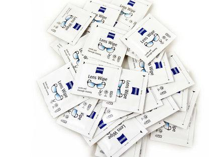 Multiple packages of Zeiss lens wipes on a white background