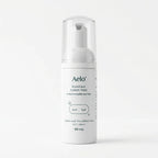Aelo eyelid and eyelash wash bottle on a white background