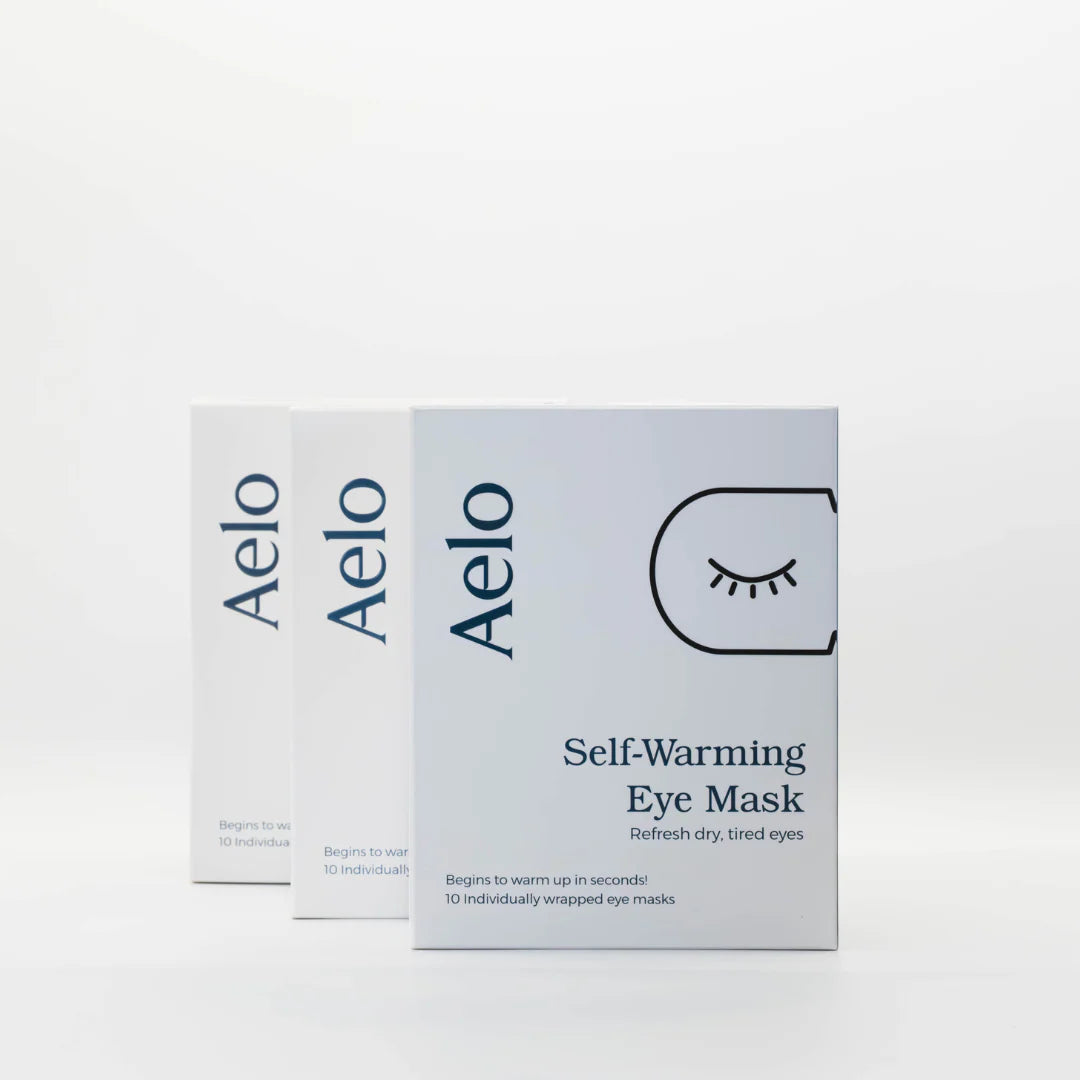 Three boxes of Aelo self-warming eye masks for dry eyes on a white background