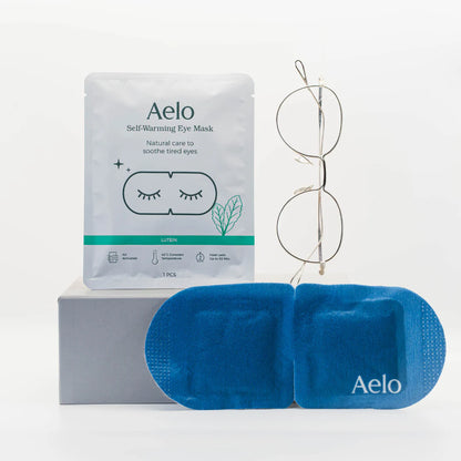 Aelo self-warming eye mask with lutein showing packaging and glasses on a white background