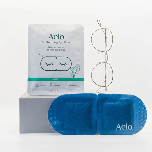 Aelo self-warming eye mask with lutein showing packaging and glasses on a white background