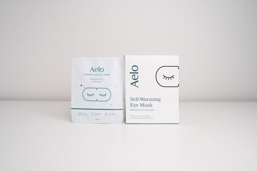 A box of Aelo self-warming eye masks on a white background