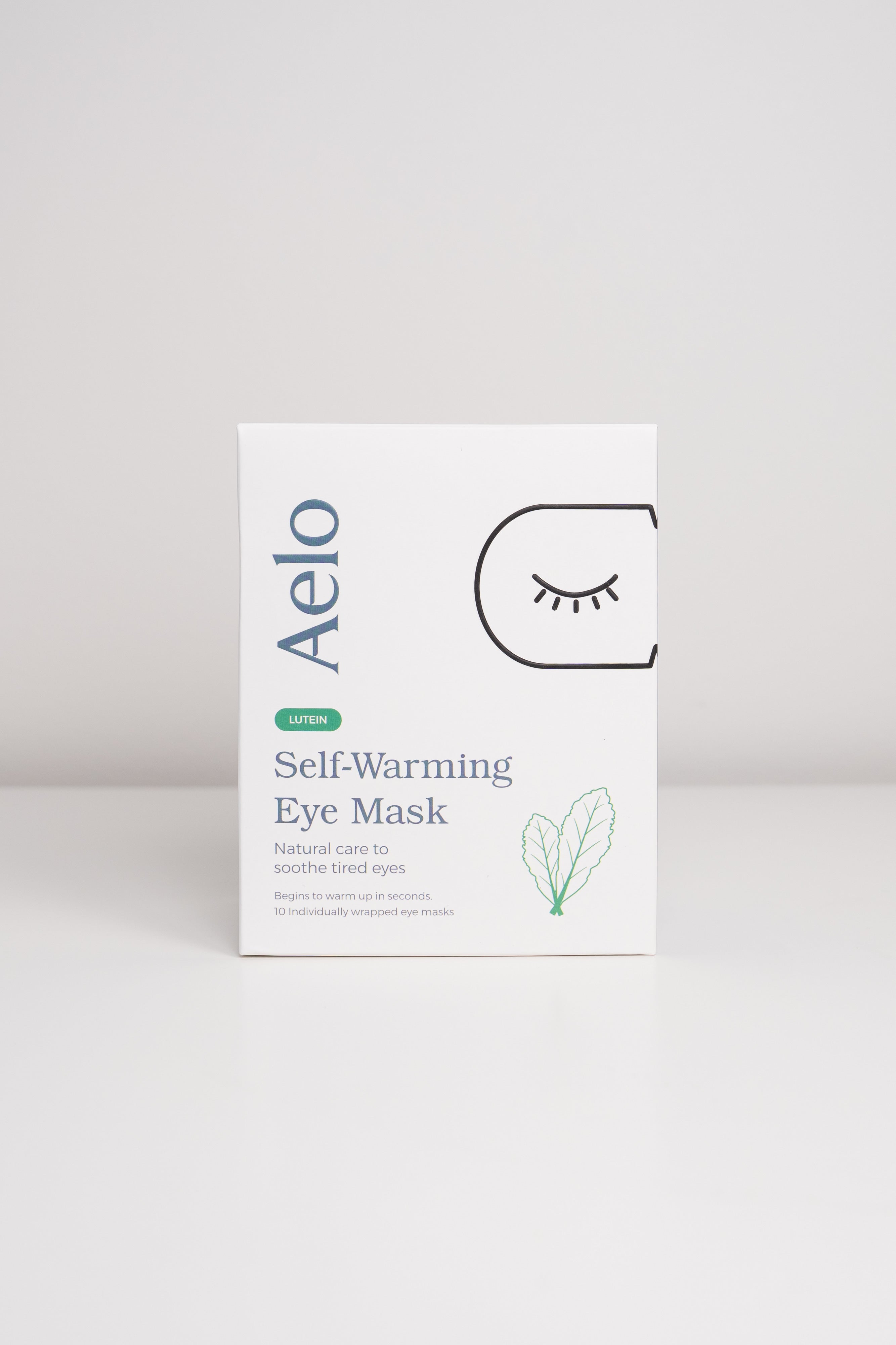 Aelo self-warming eye mask with Lutein packaging on a light gray background
