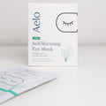 Aelo self-warming eye mask with lutein packaging on a white background