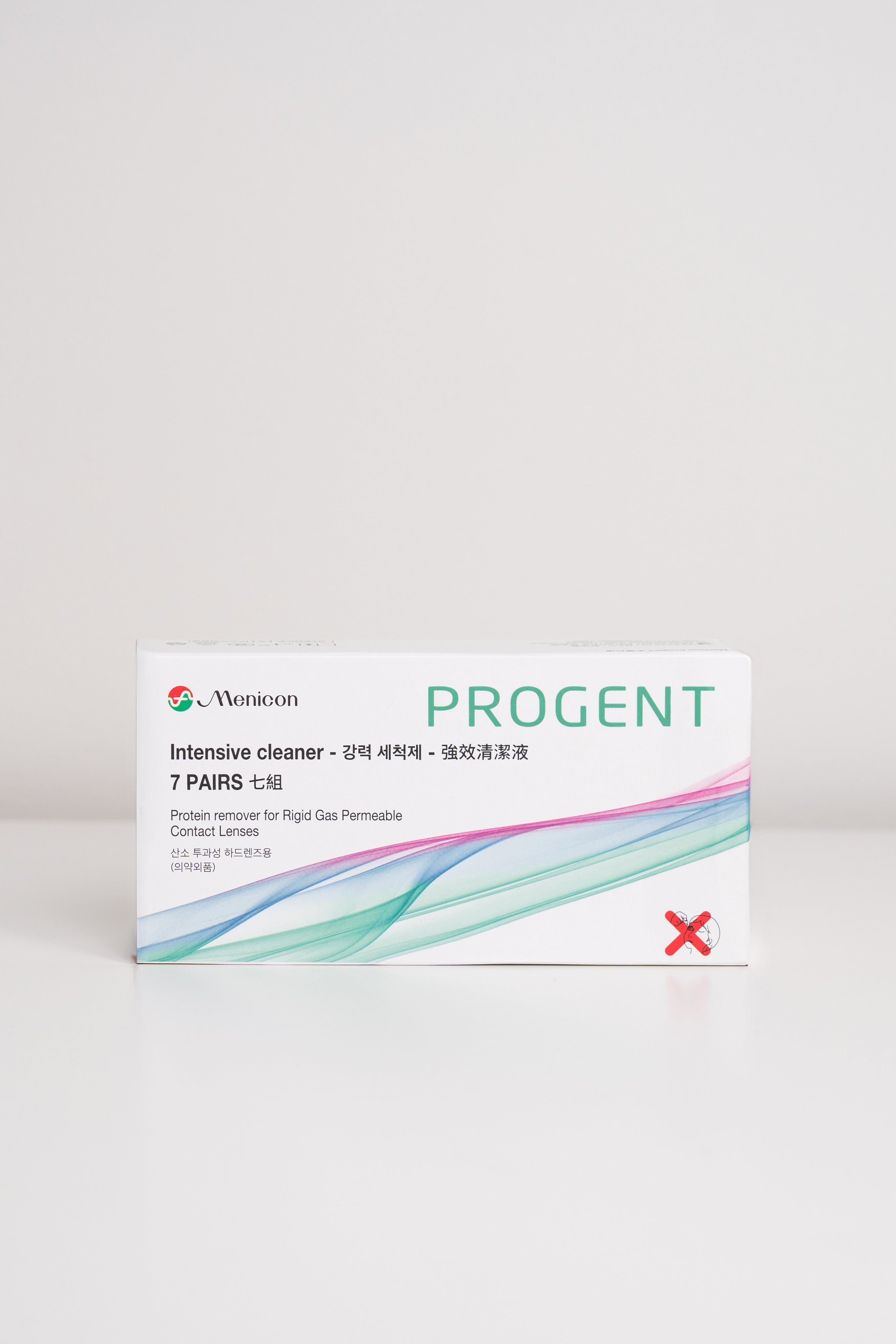 Menicon progent box on a light grey background