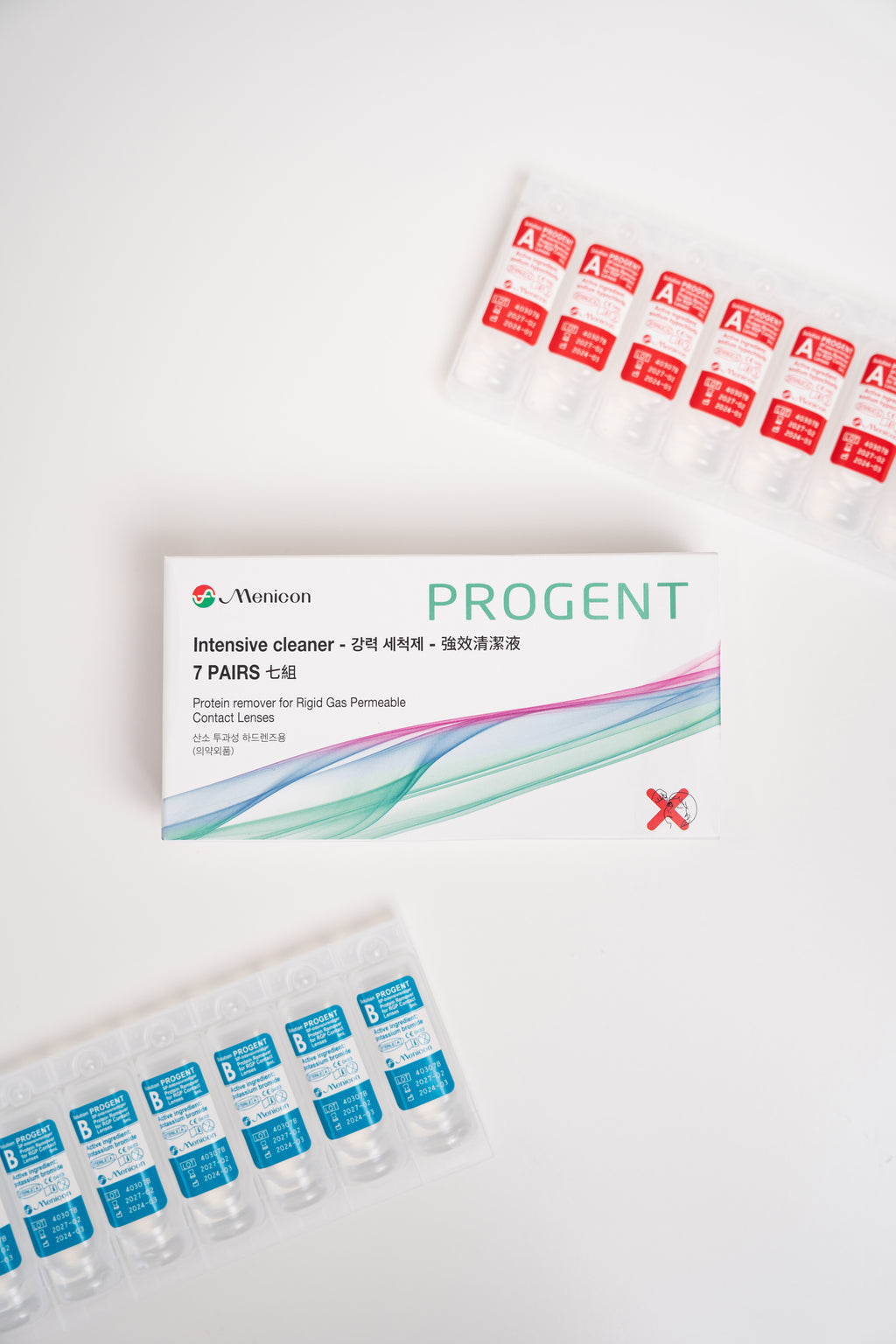 Menicon Progent contact lens care product packaging on a white background