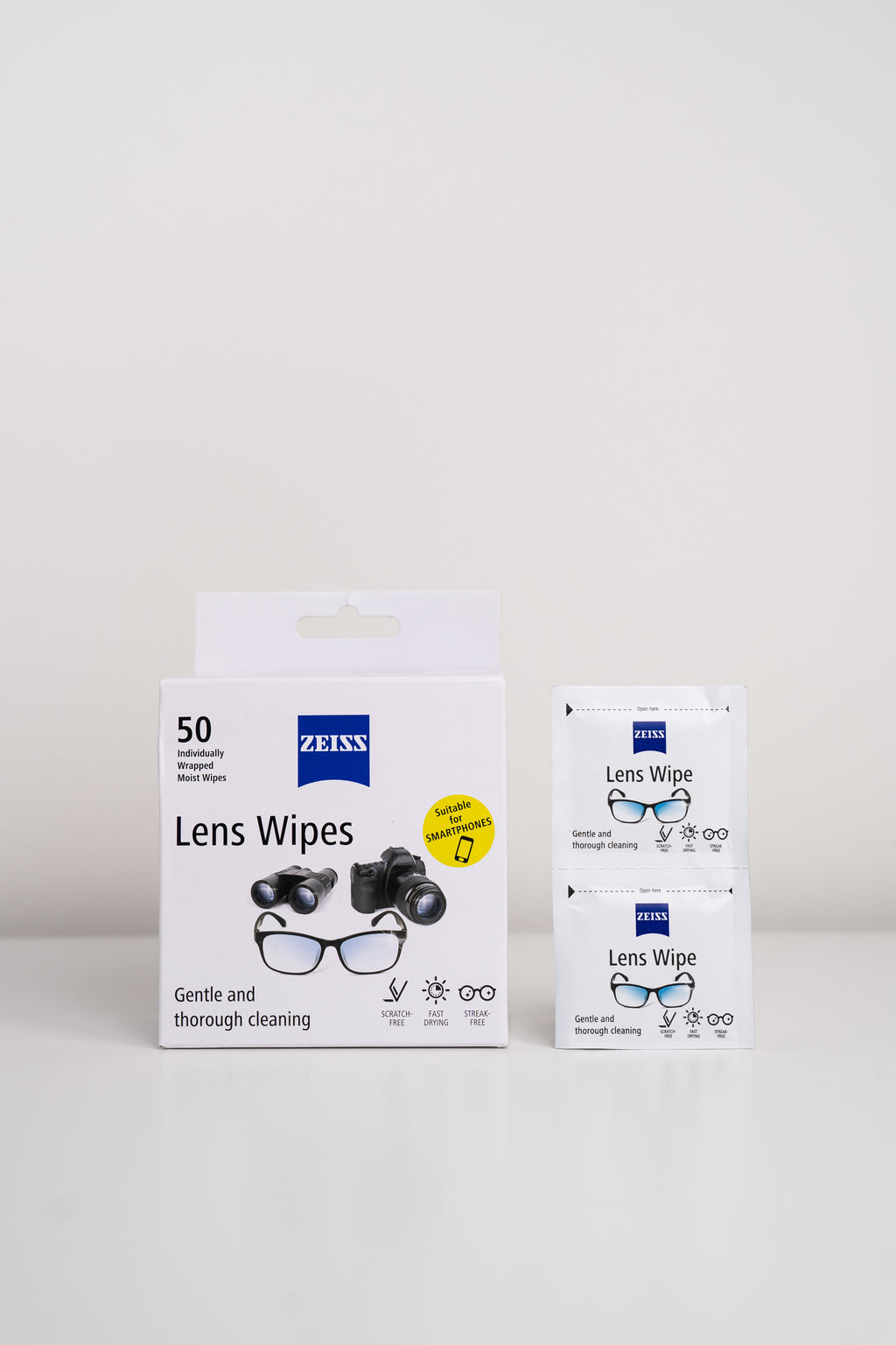 A box of Zeiss lens wipes on a light gray background